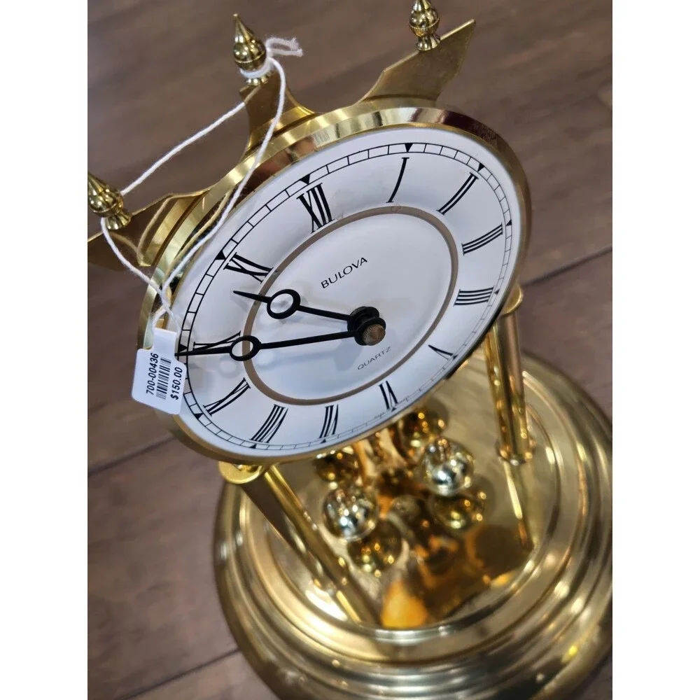 Bulova Tristan I B8818 Anniversary Clock - Glass Dome, Rotating Crystal Pendulum